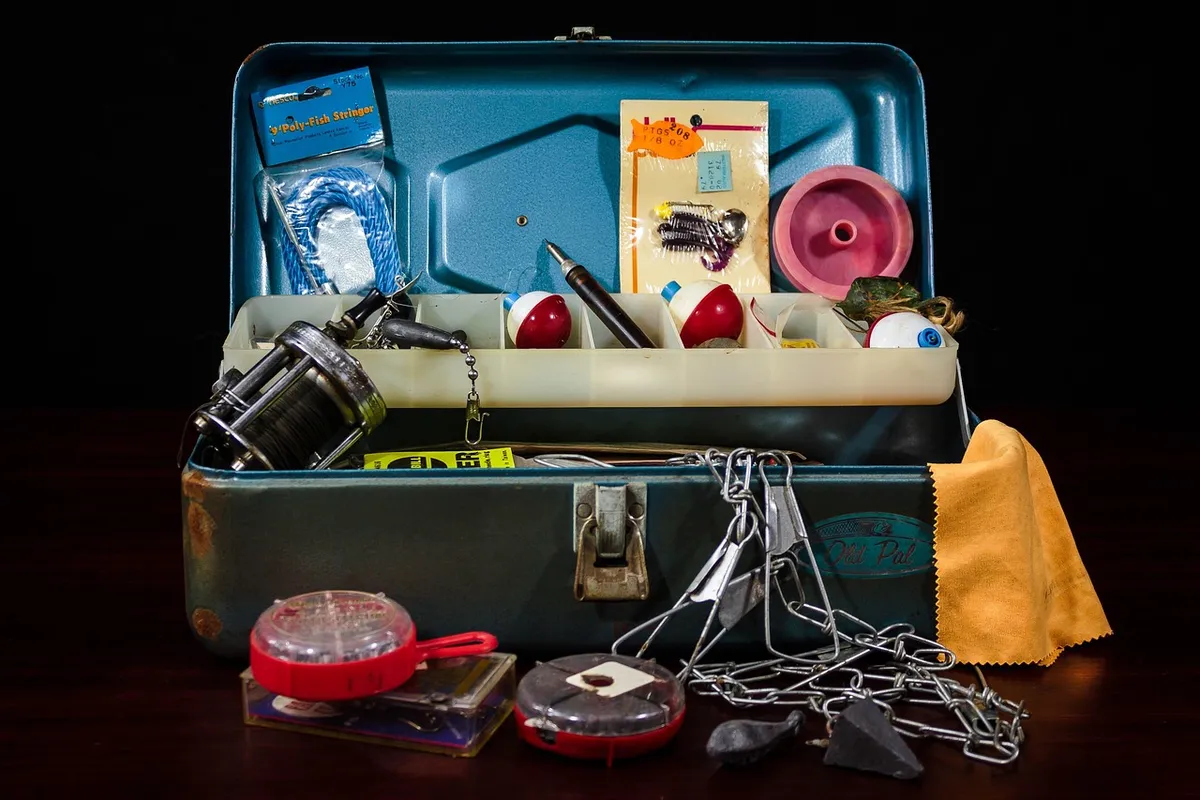 tackle box, fishing supplies, fishing gear, tackle, lures, hooks, reel, fishing line, fish hooks, bobbers, bobbins, sinkers, jitterbug, fish stringer, chain str